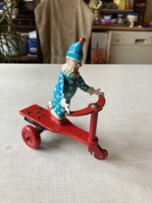 Clown (alt) auf Dreirad